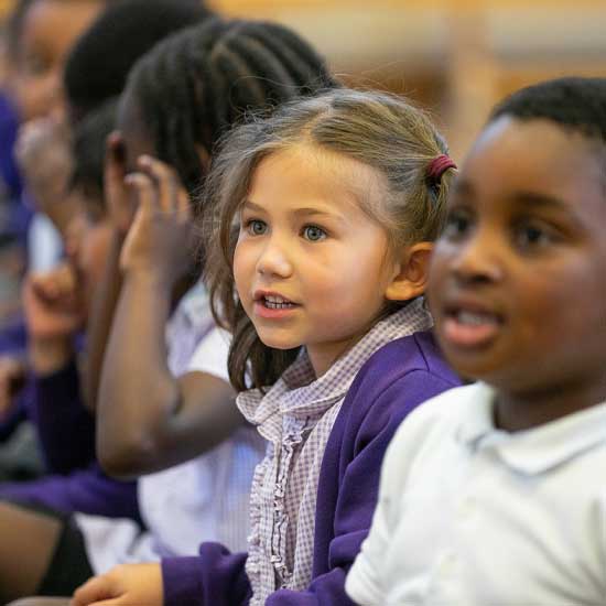 Children in school assembly